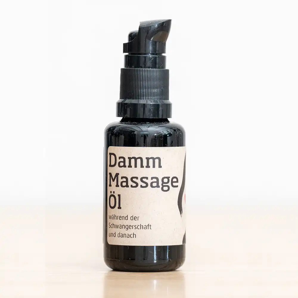 Bottle of Damm Massage Öl massage oil with pump dispenser, label mentions use during and after pregnancy in German
